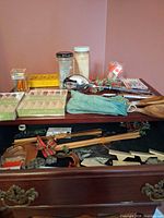 Group view of utensils, bar accessories, toothpicks, holiday picks and bulbs