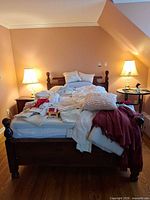 Overall bedding lot displayed on queen bed