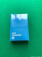 Front of sealed blue Air Canada playing card box