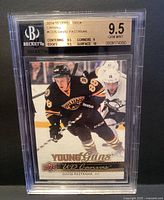 Front of graded David Pastrnak rookie card showing 9.5 label and image of player
