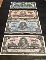Front view of four 1937 Bank of Canada notes in denomination order