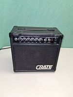 Front view of Crate GX-10 amplifier showing control panel and grille