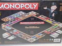 Rear of box displaying themed board and components, shrink-wrapped