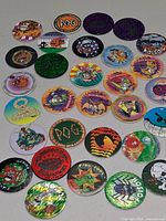 Full layout of all POG milk caps and slammers on table