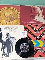 All five records laid out showing covers and Elvis 45