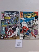 Two Spectacular Spider-Man issues side by side