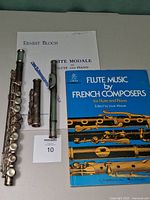 Flute pieces and two sheet music books overview