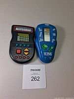 Front view of both handheld games side by side