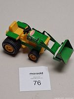 Overall view of Tonka front-end loader tractor showing size and condition