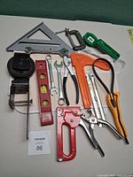 Overview of all hand tools laid out on table