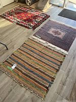 All three rugs laid out on floor