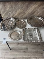 Group view of all five EP silver-plate platters and trays