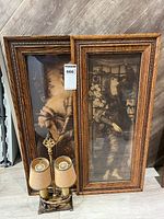 Front view showing both framed prints and lamp