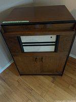 Front view of Philips record player console cabinet