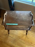 Top view showing full surface, side handles, and lower shelf