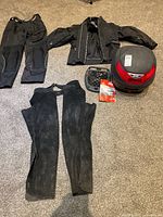 Jacket, pants, chaps, Givi case, base plate shown