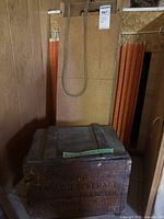wooden beverage crate front and sled behind