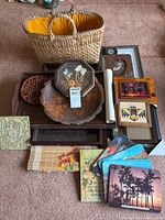 Overview showing tote, trays, framed art, placemats and other items