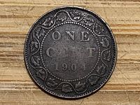 Reverse side showing ONE CENT 1904 with maple leaf wreath