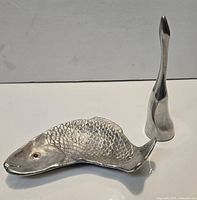 Hoselton figurine and Arthur Court fish together