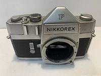 Front view of Nikkorex F body without lens, showing mount and controls
