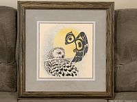 Front view of framed owl needlework showing image, mats and frame