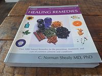 Front cover of The Illustrated Encyclopedia of Healing Remedies book