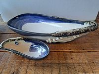 Large and small pottery mussel shell dishes, top view