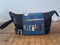 Front view of toiletry bag with accessories sleeve