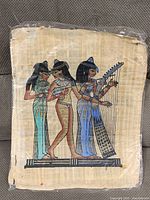 Full view of papyrus artwork wrapped in plastic