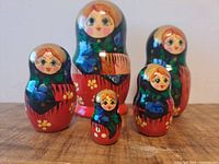 Full set of five nesting dolls front view