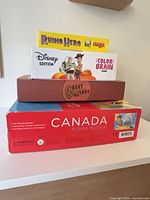 Stacked view showing all four boxed items