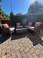 Full view of entire 4-piece set arranged outdoors