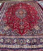 Full view of entire rug showing field, borders and overall condition