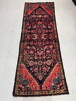 Full view of entire runner rug showing pattern and overall condition