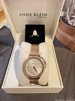 Watch and ring displayed in open Anne Klein box