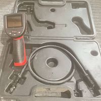 Camera handle with LCD and probe in molded case