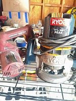 Chicago Electric toe kick saw and Ryobi router side by side