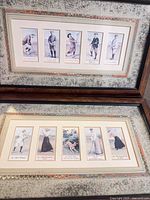 Both framed artworks stacked, showing full frames and matting