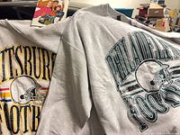 Two sweatshirts and booklet overview