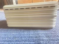 Side view of ribbed aluminum ballast housing