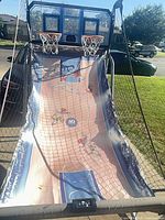 Full view of assembled dual hoop basketball arcade game