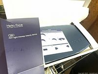 Closed box showing Hello Face branding and model L6 PDT light therapy device
