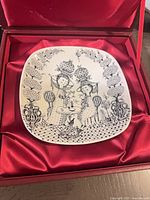 Dish in red satin box, full view