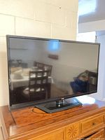 Front view of LG 42" TV on stand