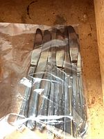 Stainless steel table knives in zipper bag