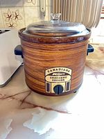 Front of Kmart Canadiana Crockery Cooker showing wood-grain exterior and label