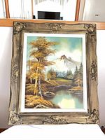 Front view of framed oil painting