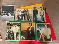 Overview showing all six framed photographic prints on colored boards