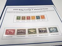 Album page showing ten mounted stamps (1c-50c) of the 1935 pictorial set